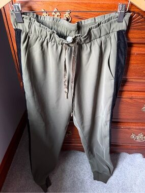 Lululemon Olive Green Jogger Pants with Black Velvet Trim along the side